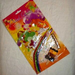 Free with purchase. New, kit to make flower petal dolls